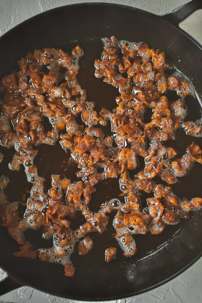bacon rendering in cast iron pan