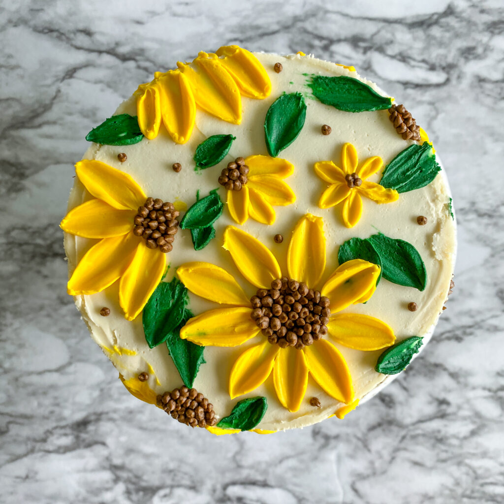 yellow sunflower buttercream decorated cake